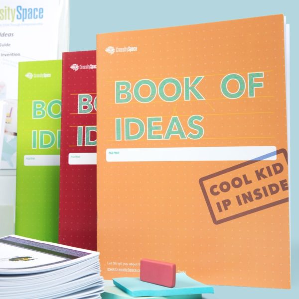 A close up of the different versions of the Book of Ideas associated with the Book of Ideas Class Pack.