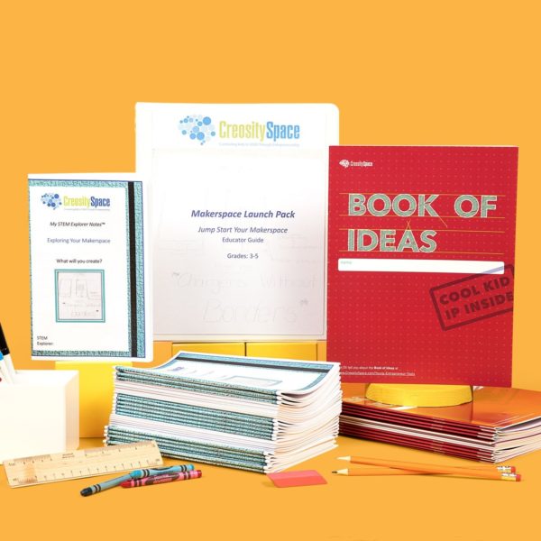 A picture of the contents of the Makerspace Launch pack - a class set of the Book of Ideas, a class set of student notebooks and a lesson guide.